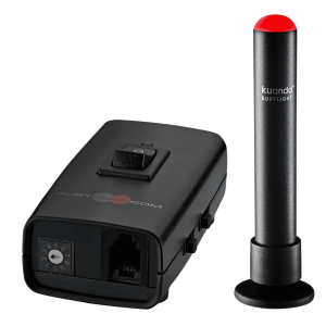 Kuando Busylight Combi on a desk showing a red light to indicate a manual busy status.